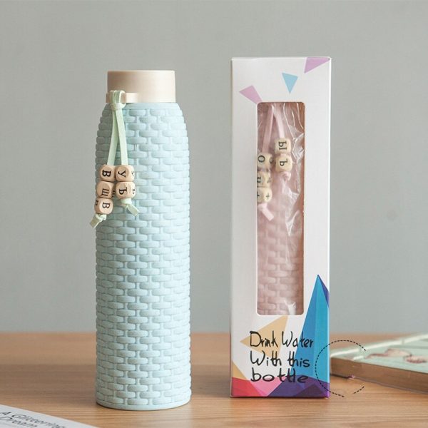 Doble 310ML botella de agua de vidrio Anti-agua hirviendo de imitación de mimbre con cuerda para niñas, bolso lindo de la botella de agua de ronda