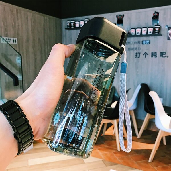 Botella de agua de plástico cuadrada botella transparente portátil zumo de fruta a prueba de fugas deporte al aire libre botella de Camping taza de la escuela